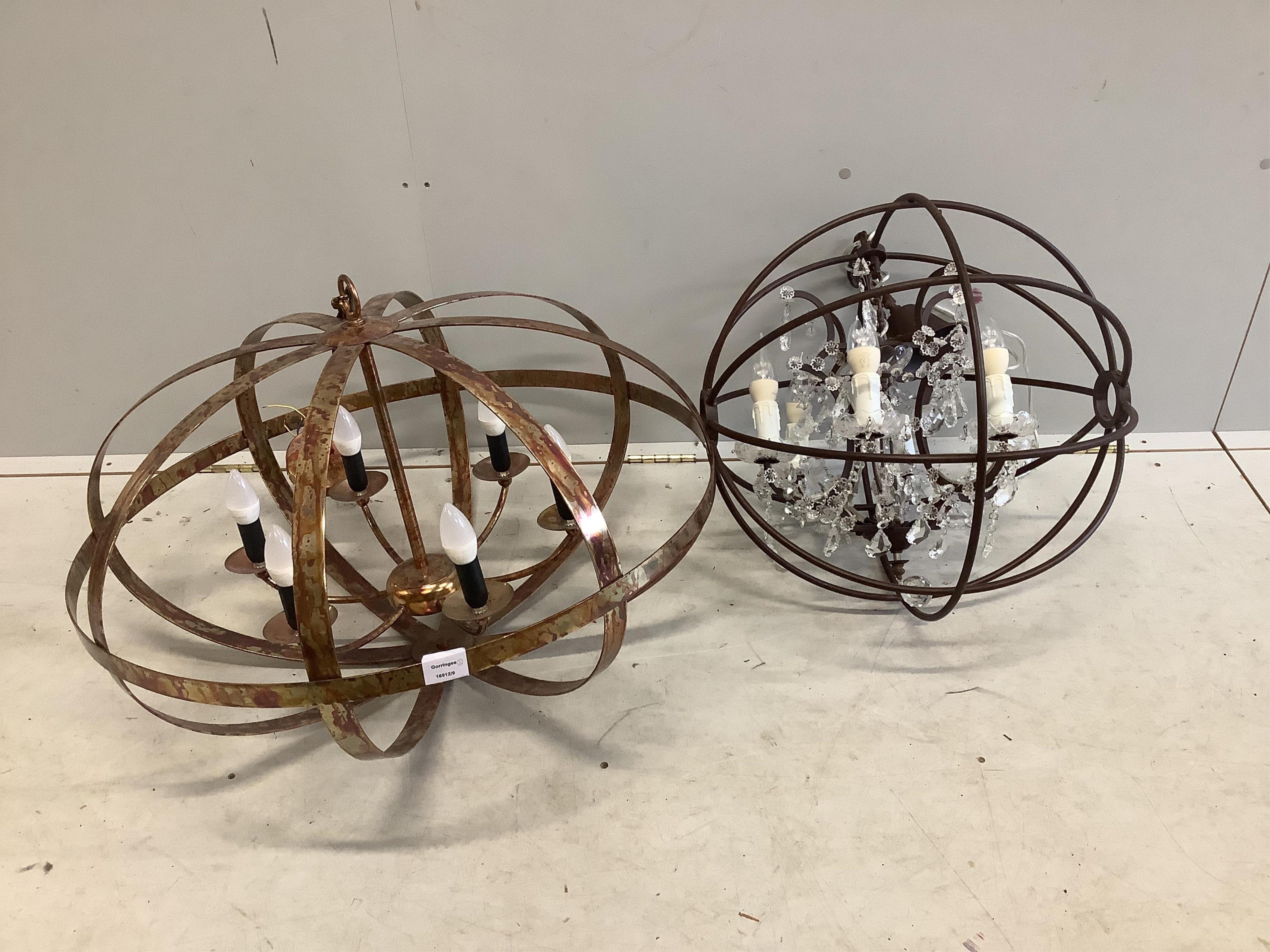 Two large Contemporary metal chandeliers, larger diameter 80cm. Condition - good